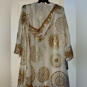 Beautiful golden Kuftan/ dress.